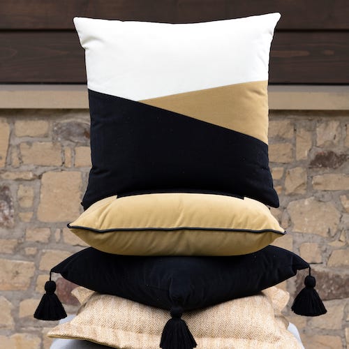 pillow stack black gold